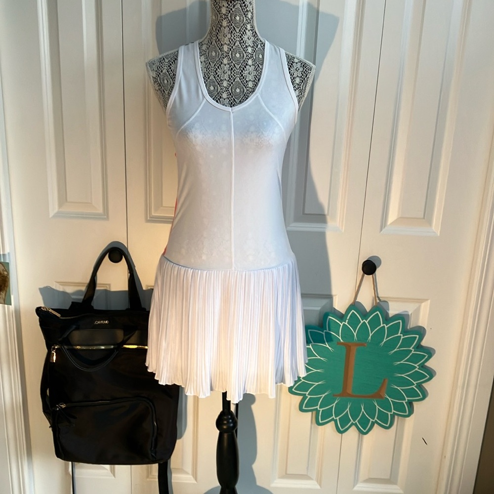 Kyodan white tennis dress with knife pleat skirt and racer back